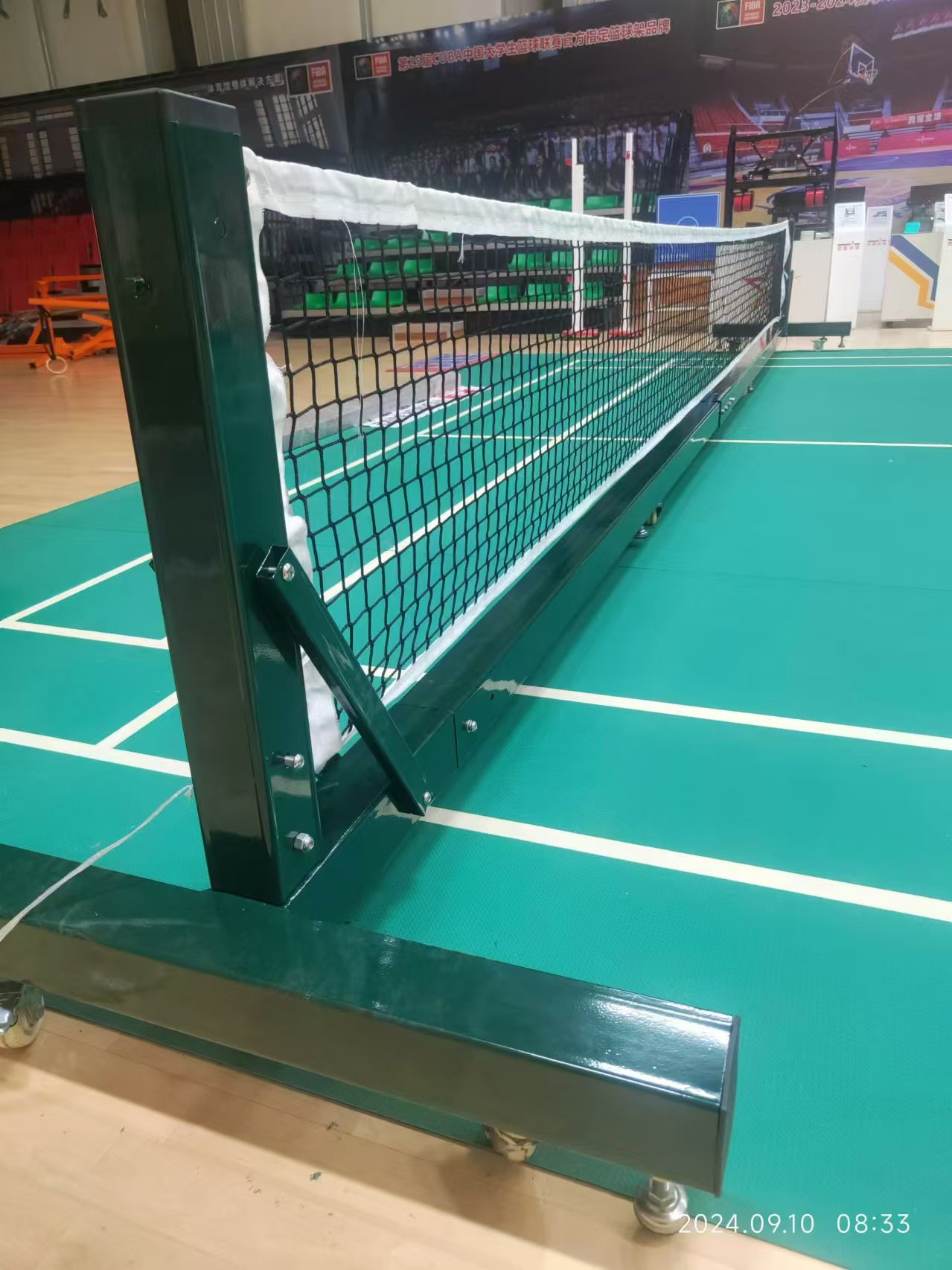 Movable pickle ball post