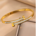 Brazalete de titanio de diamantes de diamantes de diablo de riñón entrelazado en oro