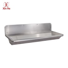 large stainless hand washing trough