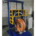 Wire rod coil ring wrapping machines