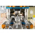 Ligne de production automatique pour la fabrication de boîtes de conserve de ketchup