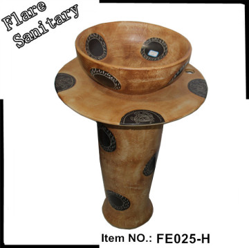 brown and black pedestal bathroom washroom sink