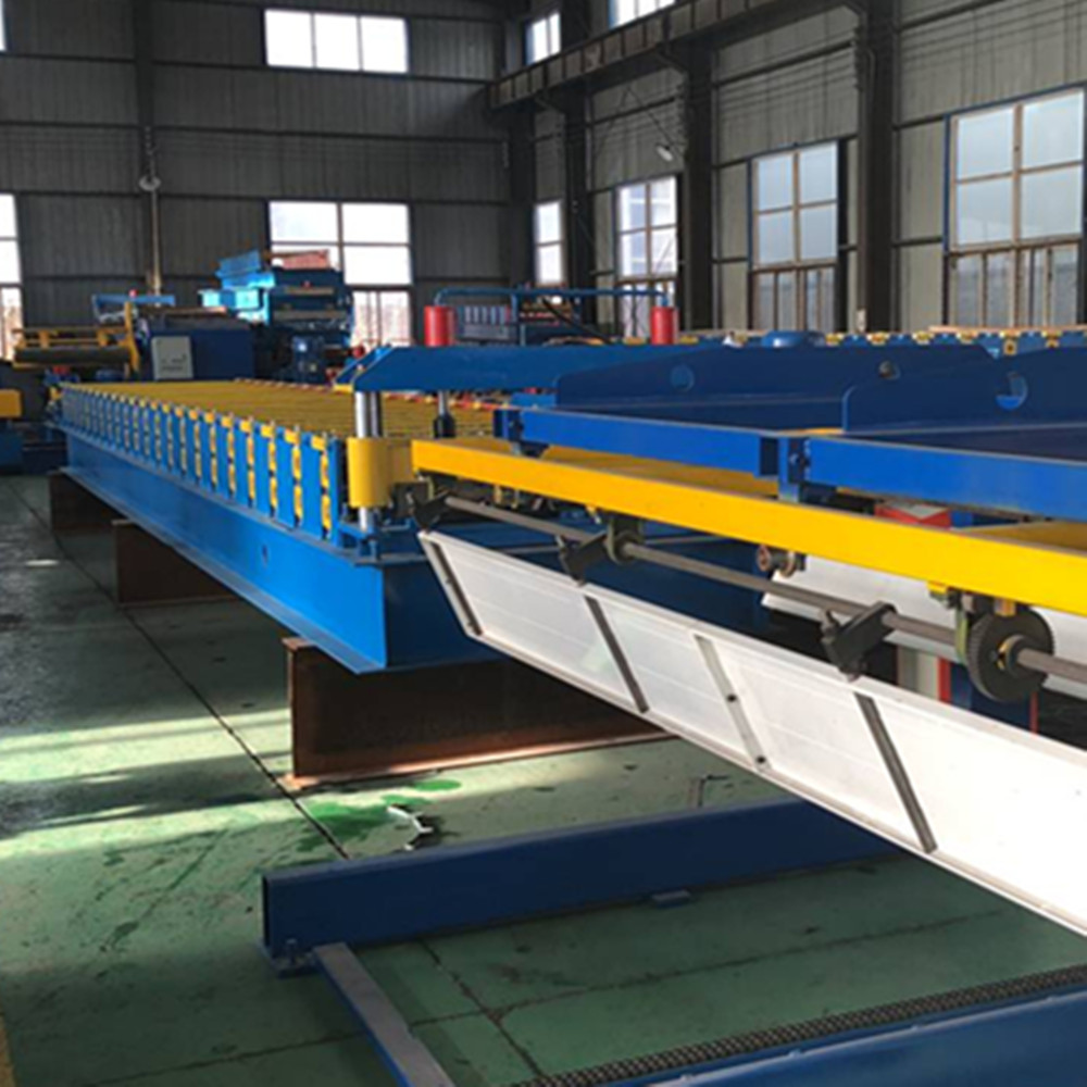 Automatic sheet stacker for roll forming machine