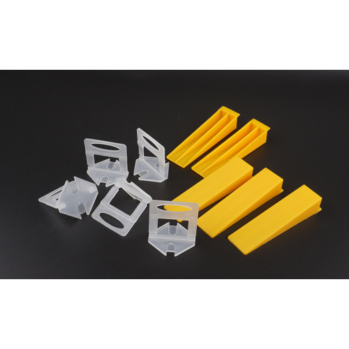Tile leveling tool with insert type