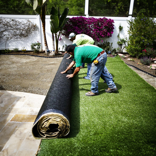 Aprimore seu quintal com grama artificial do quintal