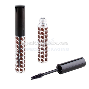 Round mascara bottle with alum cap