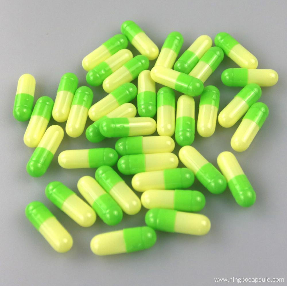 Size 00 yellow and green capsules