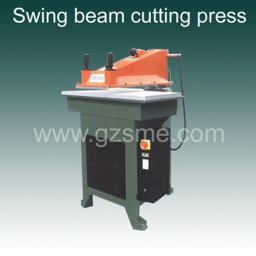 Swing beam cutting press