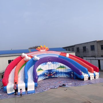 Commercial Rental: Large Inflatable Rainbow Water Slide