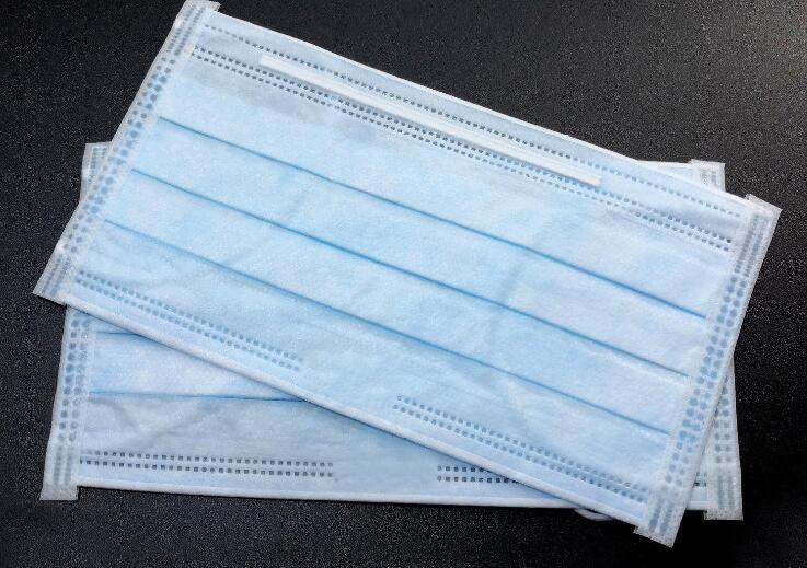 Disposable protective face mask