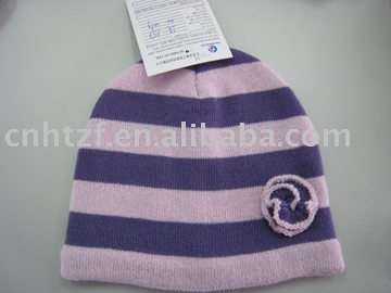 knitted striped hat with hand crochet flower