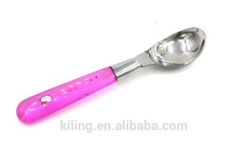 stainless steel ice cream spoon with pink plastic handle