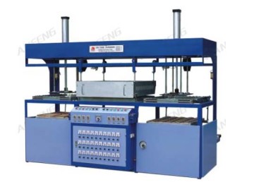 Semi automatic double head vacuum forming machine