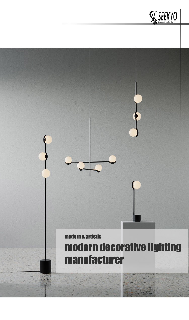 This minimalist branch metal opal glass ball pendant light is a modern and stylish addition to any home.