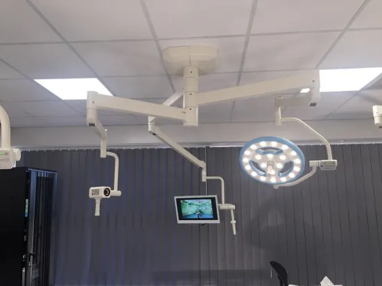 Hollow type surgical operating lamp with camera