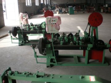Automatic barbed wire fence machine