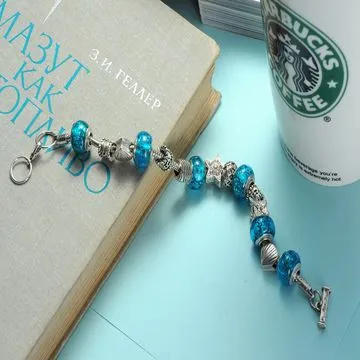 Bracelet, made of pandora beads and brass chain, professional pandora factory