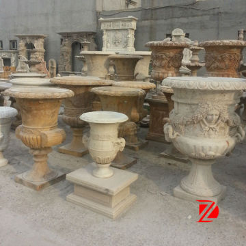 Flower pots with statues