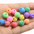 Bunte 10mm weiche Tonpolymerperlen 100Pcs Spiralmuster runder loser Raumperlenball für Schmuckarmbandherstellung DIY