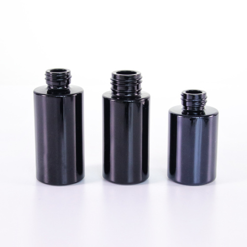 Botella de suero de vidrio negro con cuentagotas negras