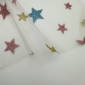 Tessuto gonne a rete glitterate con stelle colorate