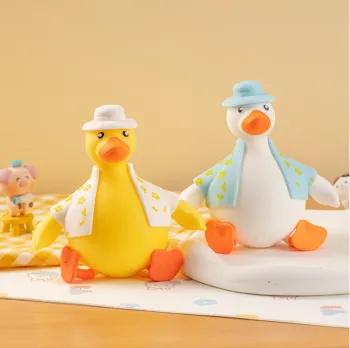 TPR soft duck toys in clothes