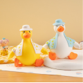 TPR soft duck toys in clothes