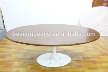 oval wood top tulip dining table