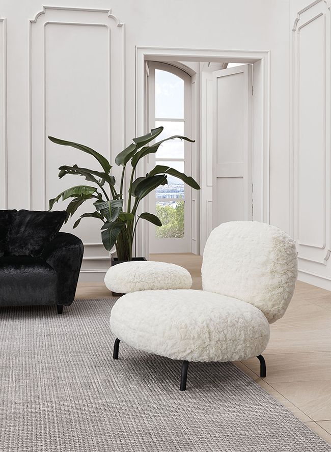 White Flocked Black Foot Cosy Armchairs