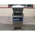 Single chamber vacuum packaging machine