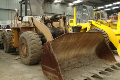 used tcm 870 loader