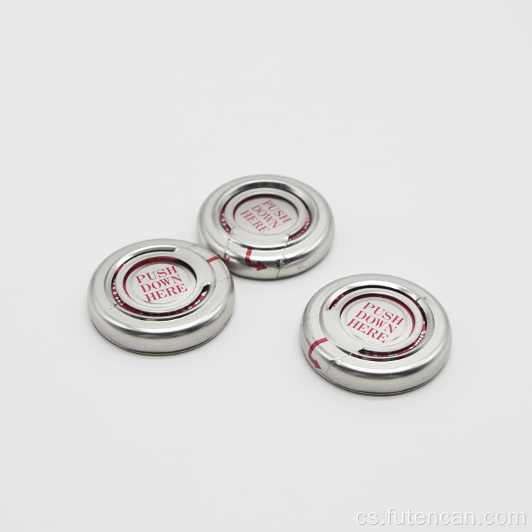 Kovový prstový lisovací uzávěr pro obalovou plechovku