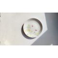 Porcelain rendered coffee cups, plates, bread plates