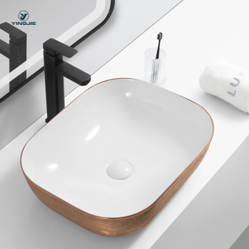 Rose Gold Counter Ceramic Hand Wash Basin - Electroplated Bathroom Sink