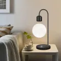 Elegante lámpara de escritorio de luz de luna con carga inalámbrica
