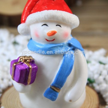 snowman christmas candle