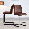 A set of two brown chairs