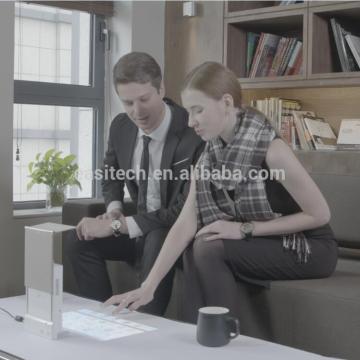 Touch mini projector turns a wall into a touch screen