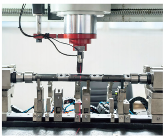 Automatic straightening machine for rocker shaft