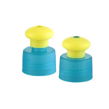 Yellow mushroom with blue push pull screw cap