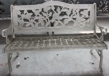 outdoor garden decorated cast iron bench