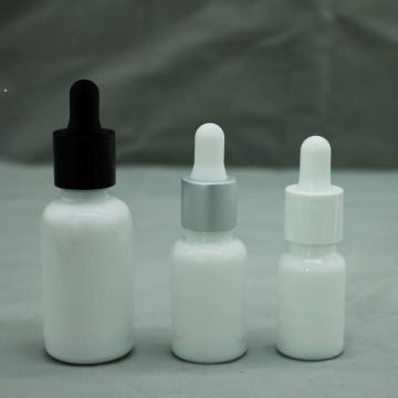 white glass cosmetic bottle with bamboo dropper
