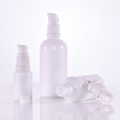 Opal white glass bottle with white lotion pump