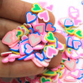 Precio de fábrica 500g Corazón Arcilla polimérica Fiesta colorida Navidad Accesorios de arte de uñas Decoración DIY Relleno de limo