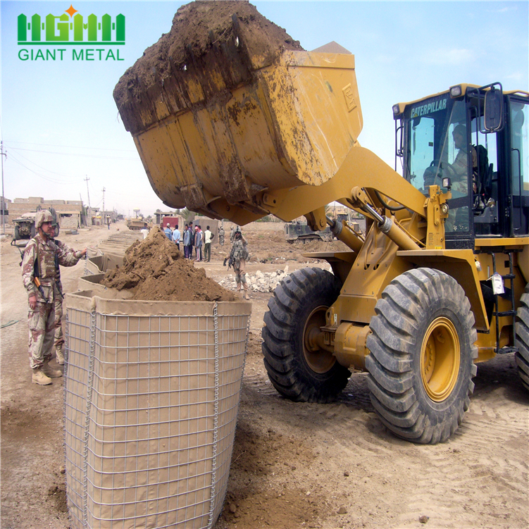 Army soldiers construct checkpoint quality hesco barriers