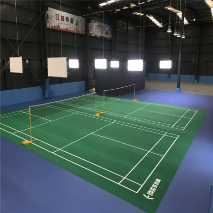 Green badminton sports flooring with white game line