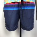 Men's dark blue strappy board loose shorts