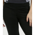Pantalon à panneau latéral contrasté noir et blanc