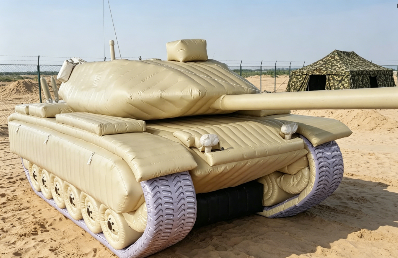 Inflatable khaki tank decoy at a training site