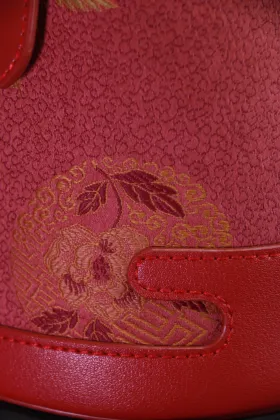 red embroidered handbag